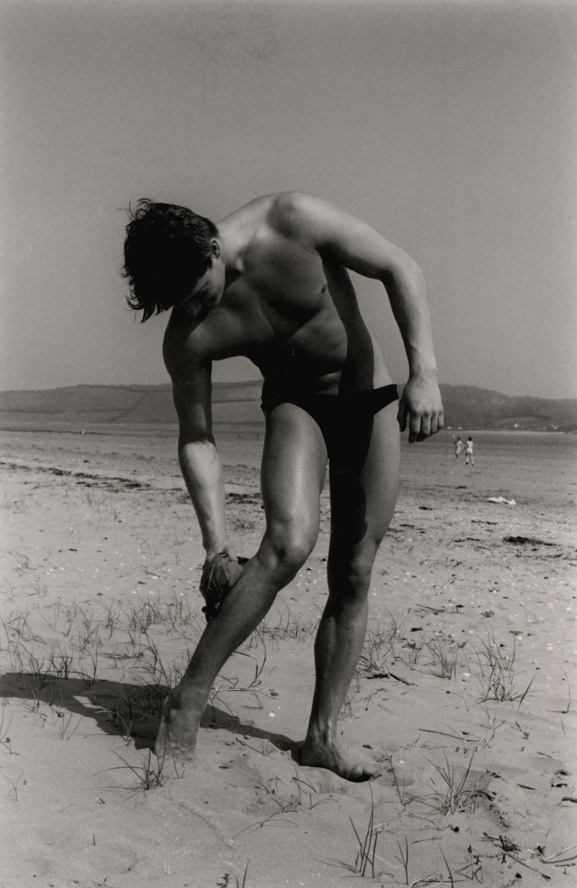 Steve Greaves Bodybuilder age 20 at Llansteffan Beach.